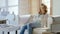 Woman sits in waiting room of gynecology clinic, reproductive system treatment