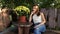 Woman sitting on a bench in the shade of the trees. Hid from the scorching, hot sun. Resting after a walk.