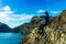 Woman sitting on a cliff on Ponta de Sao Lourenco peninsula, Madeira, Portugal