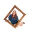 Woman sitting on floor with picture frame.