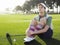 Woman Sitting On Golf Course