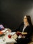 Woman sitting at her desk writing