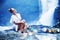 Woman sitting near waterfall