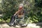 Woman Sitting Outside in Wheelchair - Horizontal