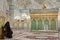 Woman is sitting in prayer hall of mosque, Iran, Yazd.