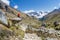 Woman sitting on a rock during the Salkantay trek