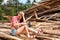 Woman is sitting on wooden boards