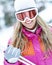 Woman skiing with ski googles in winter