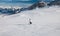 A woman is skiing at a ski resort of Kaprun, Kitzsteinhorn glacier. Austria