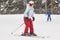 Woman skiing under the snow. Winter sport. Ski slope