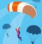 woman skydiver in air with parachute open