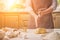 Woman slap his hands above dough closeup. Baker finishing his bakery, shake flour from his hands, free space for text.