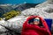 Woman in sleeping bag on the mountain