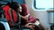 Woman sleeping in a moving train