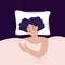 Woman sleeps in a comfortable bed. Sweet dreams, good health concept. Slumber person relaxing at bedroom. Asleep female