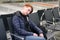 Woman sleeps in the departure area of an international airport