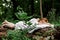 A woman sleeps in the woods on a pillow. Healthy, sound sleep concept. Rest, relaxation in nature