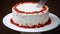 Woman slicing cake. Female hands cut cake slices.Red Velvet cake