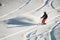 Woman sliding down from mountain on a professional snowboard