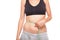 Woman slim stomach with measuring tape around it