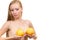 Woman small boobs holds big orange fruits