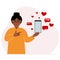 A woman with a smartphone in his hand. The concept of correspondence, communication, social networks. Lots of hearts.