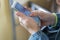 Woman with smartphone in subway. selected focus