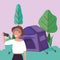 Woman with smartphone takin selfie tent camping trees