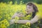 Woman smelling flowers