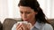 Woman smelling tea or coffee