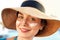 Woman smile applying sun cream on face. Skincare. Body Sun protection. sunscreen.