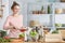 Woman smiling during cooking