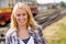 Woman smiling looking at camera vacation railroad