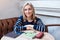 Woman smiling portrait of happy lovely and beautiful woman in casual clothes indoor sitting in cafe