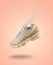 Woman Sneaker on peach color background, woman fashion, sport shoe concept, floating idea, Nike air max 95, product photography, t