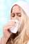 Woman with sniffles or sneezing