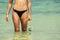 Woman with snorkel on the beach