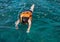 Woman snorkeling with life jackets in andaman sea