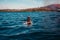 Woman snorkeling near tropical island