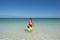 Woman snorkelling at tropical beach