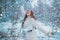 Woman in snow. Enjoying nature wintertime. Vintage winter person. Girl playing with snow in park. Beautiful young woman