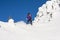 Woman Snowboarding in Alpine Terrain