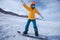 woman snowboarding in winter mountains