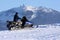 Woman on snowmobile