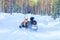 Woman on Snowmobile at Winter Finland Lapland at Christmas