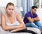 Woman on sofa after quarrel with husband