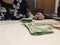 Woman with some mexican bills over a table