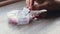 Woman sorting pills Organizer weekly shots Closeup of medical pill box with doses of tablets for daily take medicine