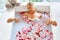 Woman Spa Flower Bath. Aromatherapy. Relaxing Rose Bathtub. Beauty