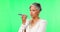 Woman, speaker phone call and talk by green screen, studio background and serious conversation in mockup. Mature indian